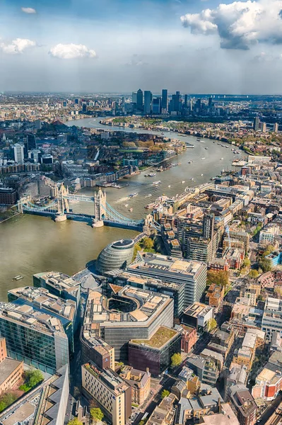Scenic aerial view of London, over the river Thames towards Canary Wharf and Eastern London