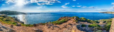 Panoramic view over the sea among the beautiful granite rocks of Santa Teresa Gallura, northern Sardinia, Italy clipart