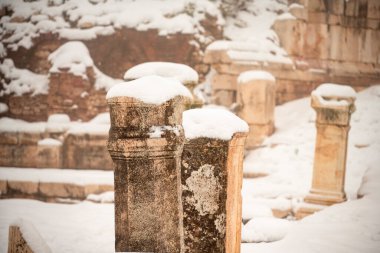 Burdur Sagalassos Archeological Site.To visit the sprawling ruins of Sagalassos, high amid the jagged peaks of Ak Dag, is to approach myth: the ancient ruined city set in stark . Sagalassos Ancient City under the snow on a winter day. clipart