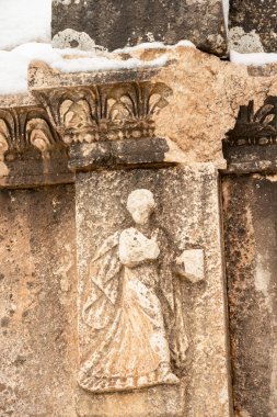 Burdur Sagalassos Archeological Site.To visit the sprawling ruins of Sagalassos, high amid the jagged peaks of Ak Dag, is to approach myth: the ancient ruined city set in stark . Sagalassos Ancient City under the snow on a winter day. clipart