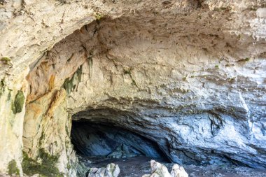 The cave is situated in Killik location of Ahirtas village at Dosemealti  district of Antalya Province.The cave is 633 m long and has two large chambers on the main gallery, which has a clearance. clipart