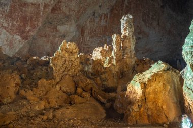 The cave is situated in Killik location of Ahirtas village at Dosemealti  district of Antalya Province.The cave is 633 m long and has two large chambers on the main gallery, which has a clearance. clipart