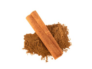 Cinnamon sticks and heap of powder isolated on white background, top view