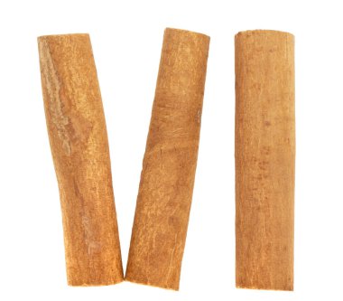 Tarçın çubukları, Roma rakamı altı kavramı, beyaz arka planda izole edilmiş..