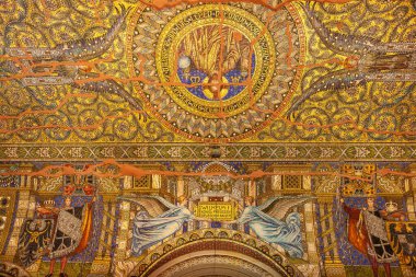 Berlin, Germany - July 6, 2011 : Mosaic on wall and ceiling of the  Kaiser Wilhelm Memorial Church, honoring Willhelm I as king and Kaiser