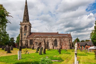 Rolleston-on-Dove, United Kingdom - May 14, 2011 : St Mary's Church, Church Road, Rolleston on Dove. Parish church of Church of England surrounded by graves dating back to the 1700's.