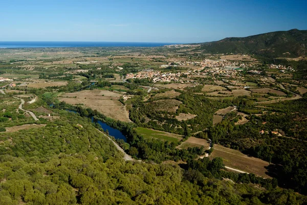 从Casteldoria塔俯瞰Viddalba和Badesi 图库照片