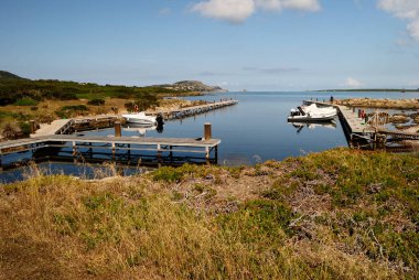Cala Vacca kıyıları
