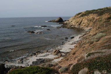 Coscia di Donna yakınlarındaki Stintino kıyısında.