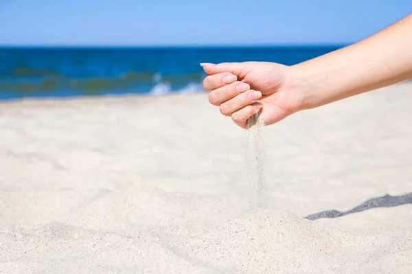 stylish beautiful hands sypyat sand sea summer on the nature