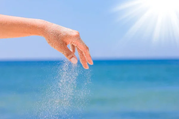 Hands Pouring Sand Sea — Stock Photo, Image