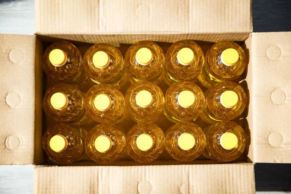 Many Bottles Sunflower Oil Box Background — Stock Photo, Image