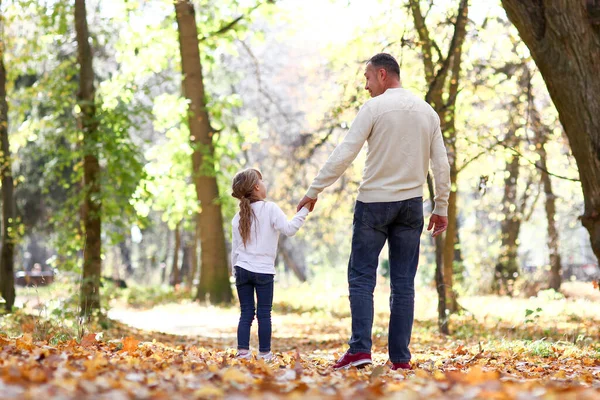 Father Walks Child Park Autumn Concept Family Together Stock Picture