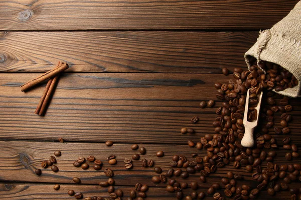 a coffee bean bag on wooden background