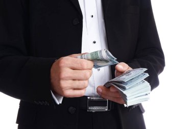 Beyaz arka planda parası olan bir iş adamı