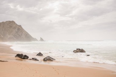 Portuguese beach Adraga on a cloudy day, Portugal