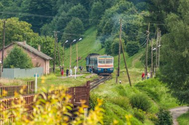 Suburban train departs from station