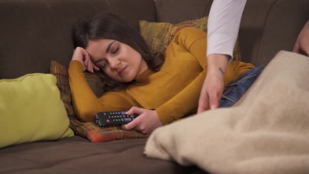 Closeup Young Brunette Sleeping Corner Sofa Holding Remote Control Two — Wideo stockowe