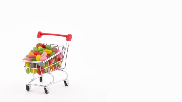 Half Frame Supermarket Trolley Filled Vivid Jelly Candy Beans Rotating — 비디오