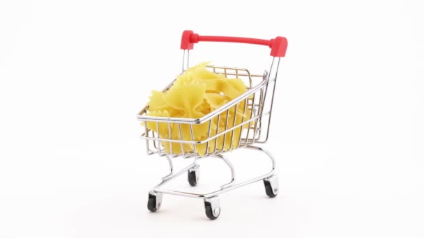 Shopping Cart Filled Farfalle Pasta Rotating Turntable Isolated White Background — Stockvideo