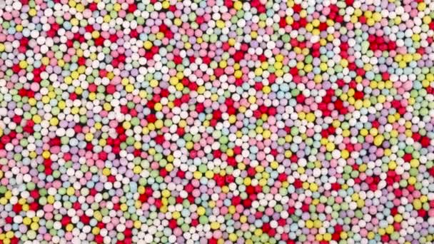 Macro Shooting Top View Small Vivid Sprinkles Sugar Candies Rotating — Stock Video