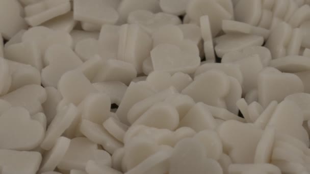 Pile Small Heart Shaped White Candies Rotating — Stockvideo