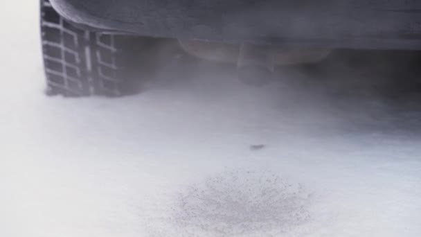 Diesel Powered Auto Toxic Exhaust Gas Emissions Tailpipe White Snow — Stockvideo