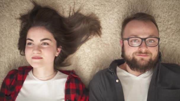 Top View Happy Young Couple Lying Floor Looking Camera Smiling — Stock videók