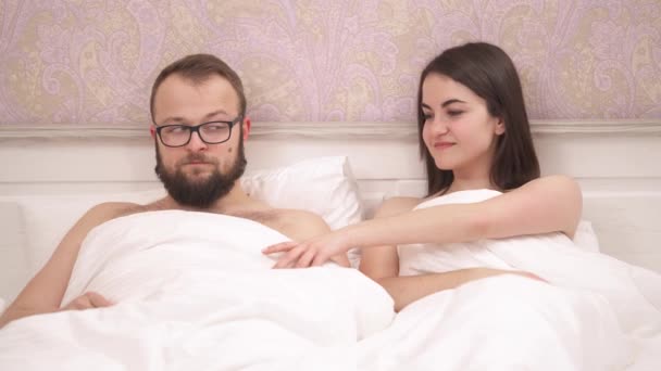 Young Couple Having Problems Bed Girl Lifts Blanket Unpleasantly Surprised — Stockvideo