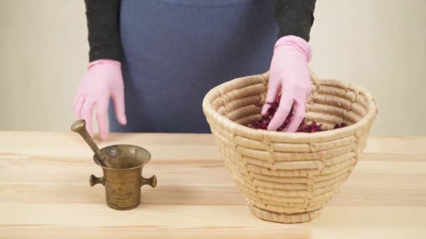 Girl Natural Cosmetics Producer Puts Dried Rose Petals Basket Copper — Vídeo de Stock