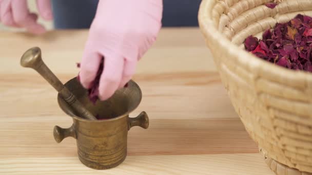 Girl Shifts Dried Rose Petals Basket Copper Mortar Pestle Process — Vídeo de Stock
