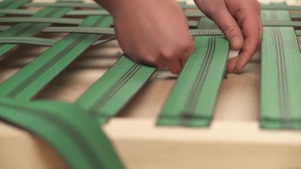 Side View Man Weaving Semi Elastic Bands Wooden Frame Attaching — Αρχείο Βίντεο