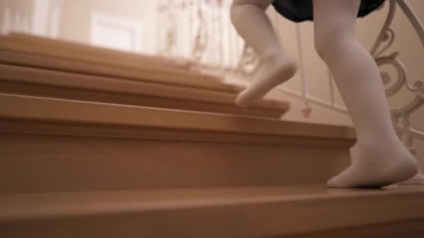 Close Legs Little Girl White Tights Walking Wooden Stairs Home — Stockvideo