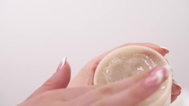 Closeup Female Hand Taking Scrub Spa Treatments — Stockvideo