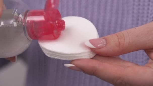 Closeup Woman Saturating Cotton Pad Micellar Water — Αρχείο Βίντεο