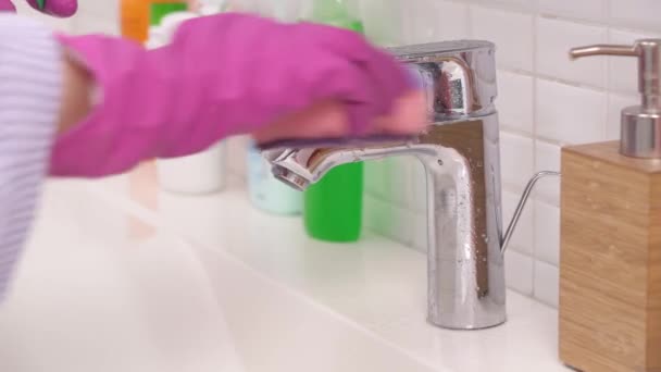 Close Woman Hands Pink Gloves Cleaning Water Chrome Crane Bathroom — Stock videók