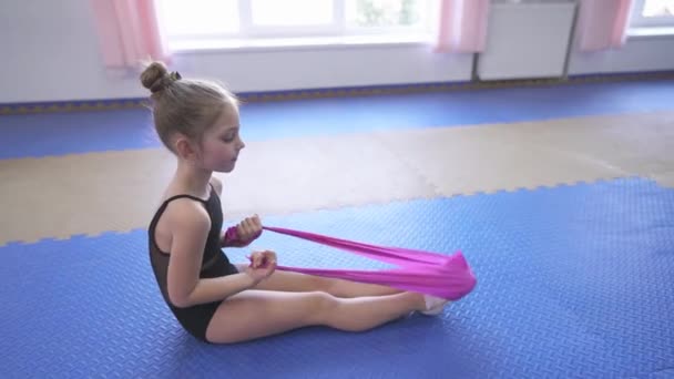 Little Female Gymnast Doing Stretching Exercises Gym While Training Exercises — стоковое видео