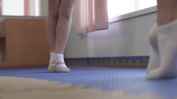 Close Young Gymnast White Pointe Shoes Standing Tiptoes Doing Exercises — Stock videók