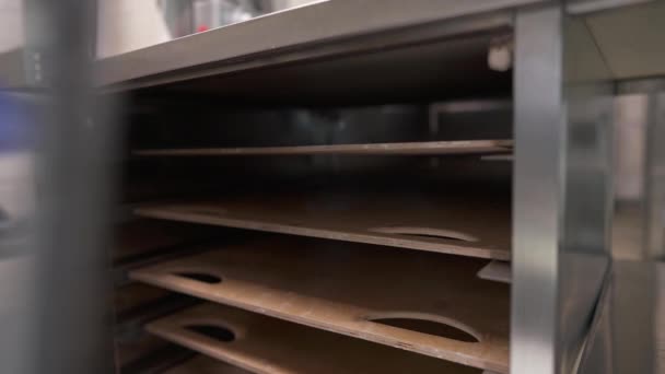 Professional Chef Opens Front Door Shelve Takes Out Tray Fill — Stock Video
