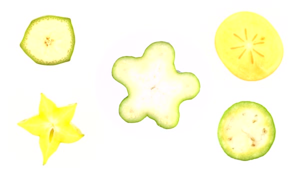 切割的奇异热带水果片在白色背景上旋转的纹理 精致的烹调概念 — 图库视频影像