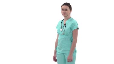 Genç ve güzel bir bayan doktorun, başını hareket ettirerek negatif duygularını ifade etmesi. Meslek kavramı, tıp ve sağlık, tıp eğitimi