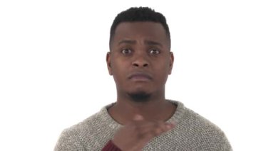 Pissed off young man feels fed up, isolated over white background. Negative emotions and feelings concept.
