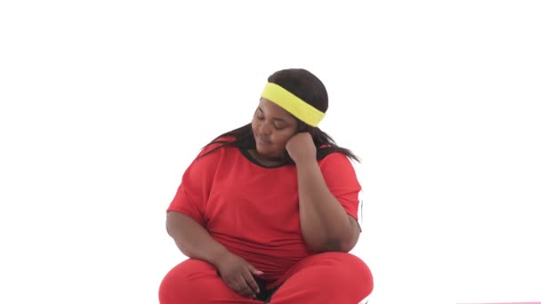 Portrait Black Woman Overweight Seating Floor Sportswear Scale Isolated White — Stok Video