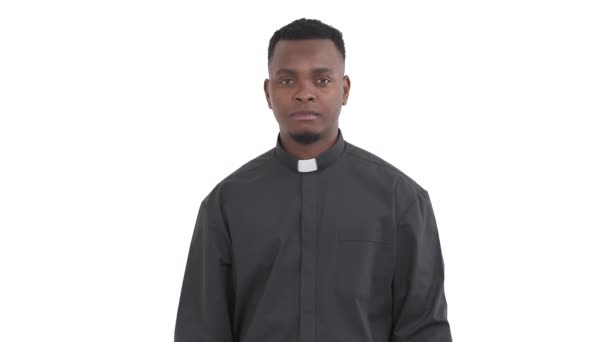 Portrait Smiling Black Priest Holding Arms Upwards Praising God Saying — Stock Video
