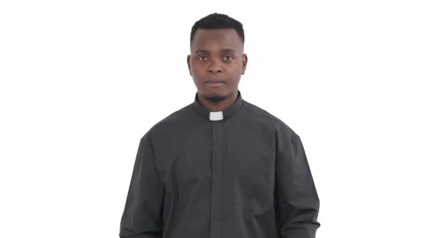 Portrait Praying Black Priest Folding Hands Together Looking Plea Isolated — Stock Video