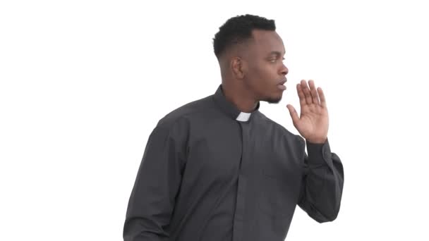 Portrait Black Young Priest Speaking Looking Aside Holding Hand His — Stock Video