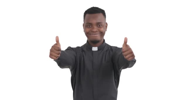 Portrait African Smiling Priest Showing Thumbs Both Hands Close Camera — Stock Video