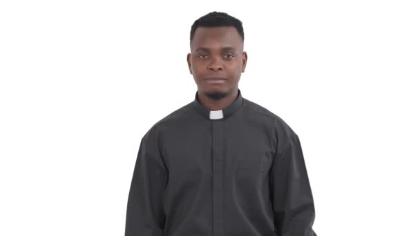 Portrait Young African Priest Connecting Thumb Forefinger Circle Holding Another — Stock Video