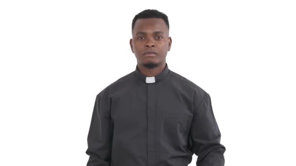 Portrait Young African Priest Showing Stop Gesture Raising Palm Left — Stock Video