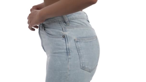 Side View Young Slim African Woman Unbuttoning Taking Skinny Jeans — Stock Video